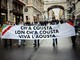 Lo striscione in via XX Settembre: da sinistra , Romeo Barailler, Ivan Barailler, Renato Ferraris, Davide Oreiller , Enrico Donnet