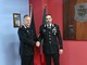 Il comandante del gruppo tenente colonnello Livio Propato ( a sn.) si congratula con Roberto Nossein per il nuovo incarico