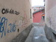 Graffiti sui muri di abitazioni in passage du Verger