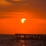 Eclissi parziale di sole, lo spettacolo al tramonto nei cieli d'Italia Eclissi parziale di sole, lo spettacolo al tramonto nei cieli d'Italia